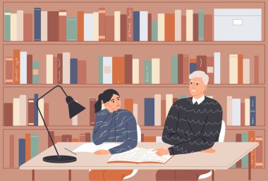 Öğretmen öğrenciye bireysel bir ders veriyor.