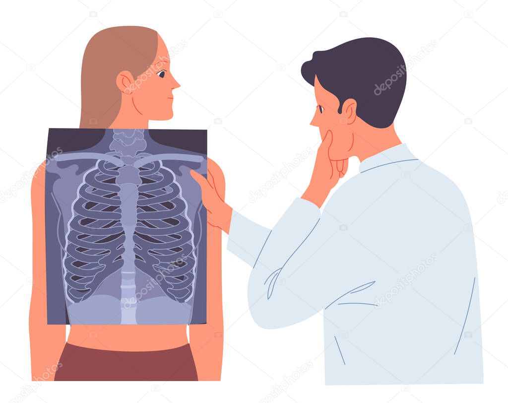 Doctor looks at the X-ray of the patients lungs