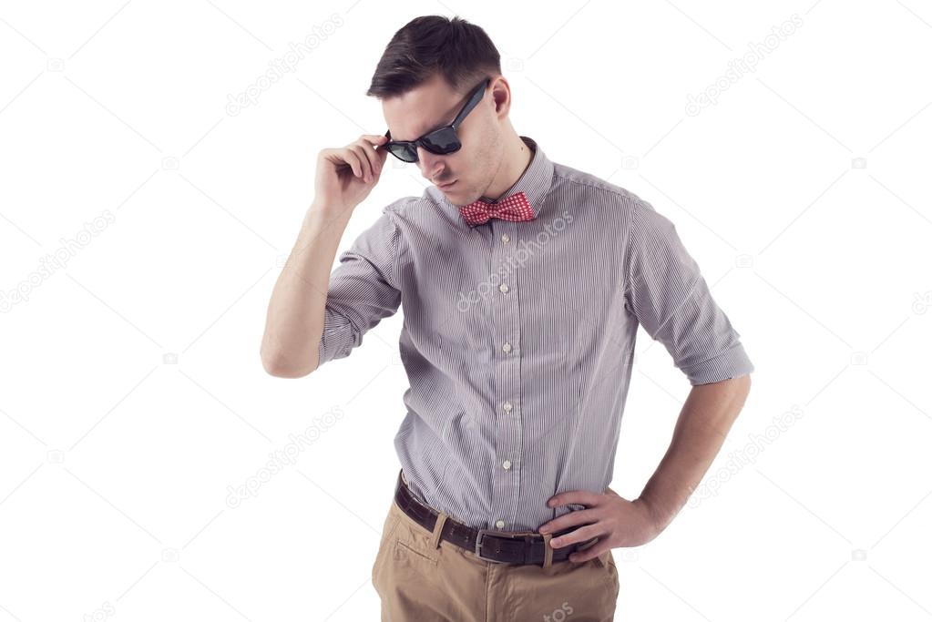 Young man hipster with red bow tie sunglasses shirt short sleeves.
