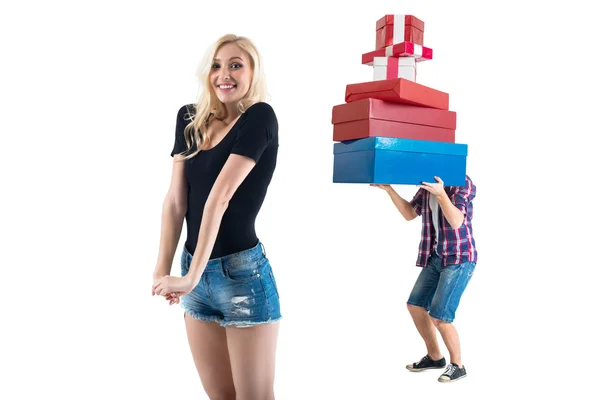 Perfect couple finished there date  with shopping. Blond girl is super happy  and  guy holding all they bought. — Stock Photo, Image