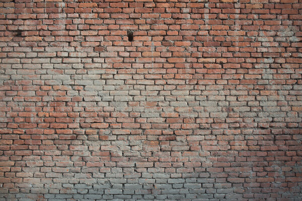 Old vintage brickwall street rusty grunge aged rough wall background texture.