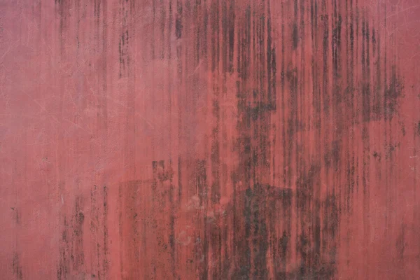 Red old vintage aged cement street rusty grunge rough wall surface background. — Stock Photo, Image