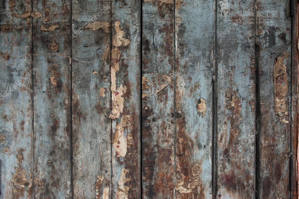 Old damaged wooden wall or fence aged and weathered. — Stock Photo