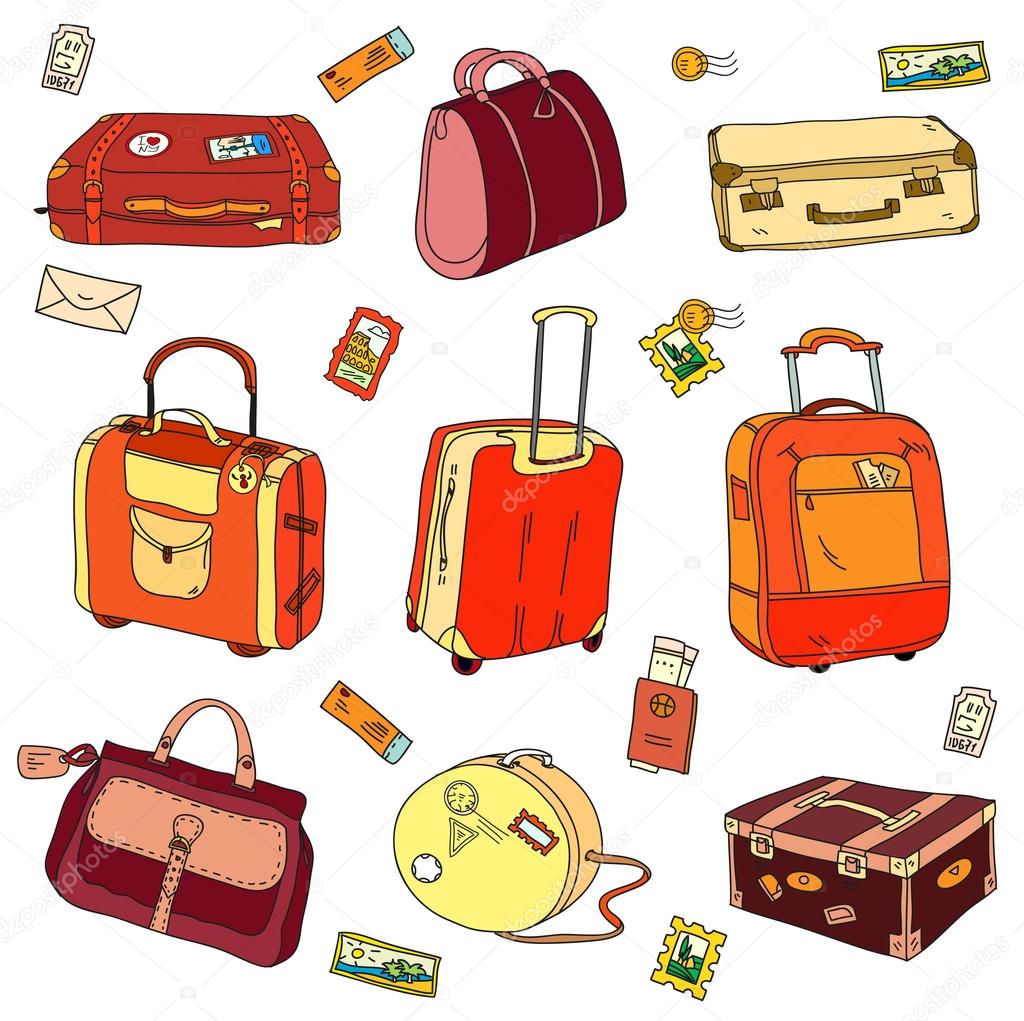 Collection of vintage travel suitcases with stickers 