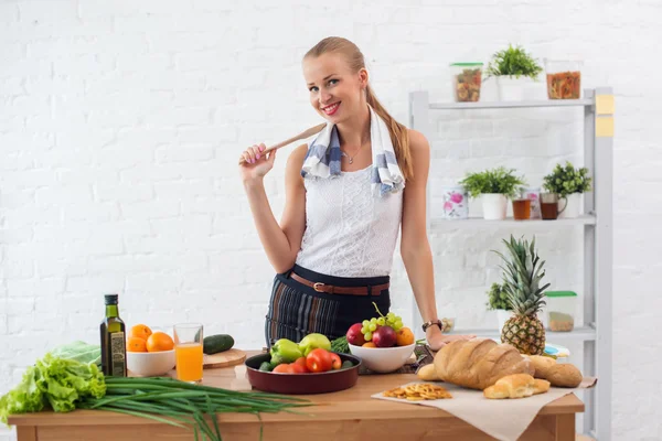 Woman preparing dinner in a kitchen concept cooking, culinary, healthy lifestyle. — Stock Photo, Image