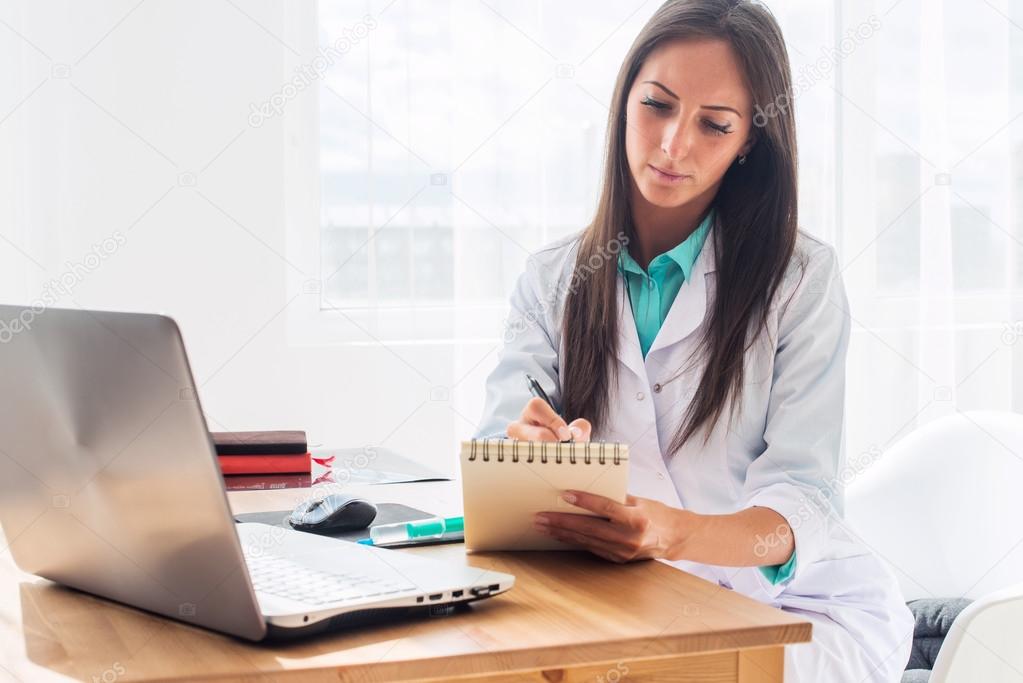 Portrait of physician working