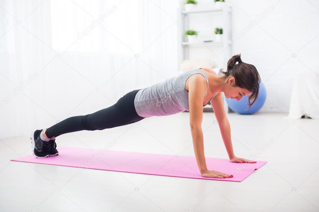 fit woman doing push-ups
