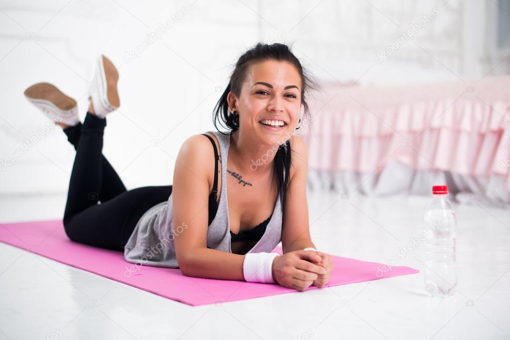 Young woman relaxing after workout