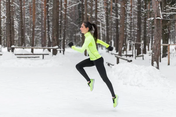 Side view of active sporty young  woman — Stock Photo, Image