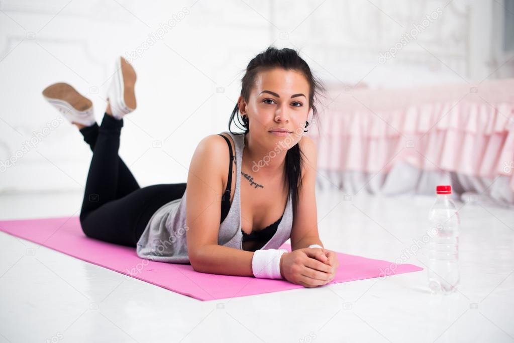 Young woman relaxing after workout