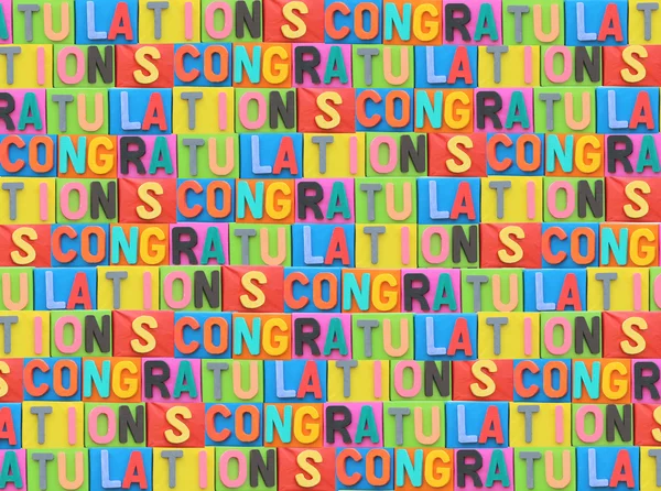 The colorful font of congratulation on paper box. — Stock Photo, Image