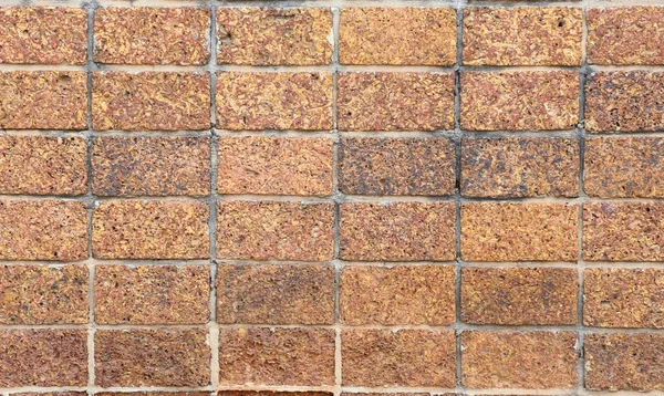 Alte Steinmauer Textur in verwitterten. — Stockfoto