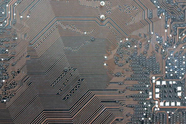 Hnědá elektroniky pozadí počítače mainboard. — Stock fotografie