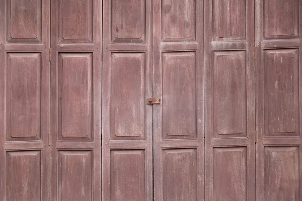 Vintage vecchia porta di legno e hanno resistito alle intemperie . — Foto Stock