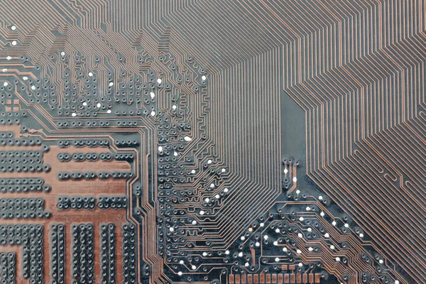 Fondo electrónico marrón de la placa base del ordenador . — Foto de Stock