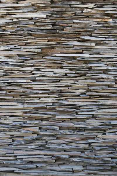 Vecchio muro di pietra Texture in resistente alle intemperie e hanno superfici naturali . — Foto Stock