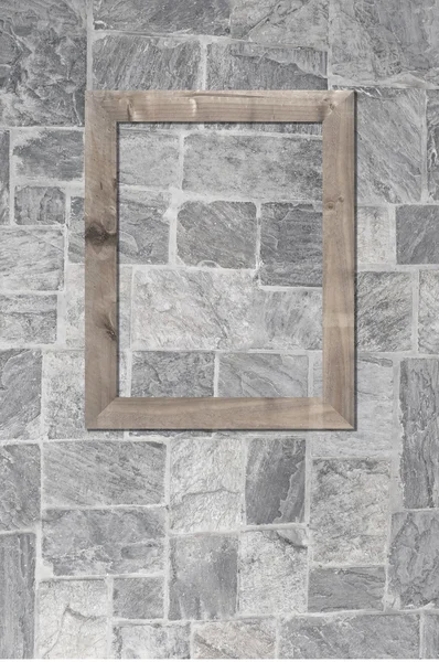 Antiguo marco de madera sobre fondo de pared de piedra . —  Fotos de Stock