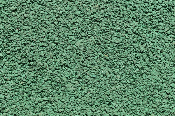 Surface green stone floor of artificial synthetic texture. — Stock Photo, Image