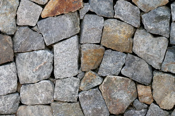 Viejo muro de piedra Textura en envejecido y tienen superficies naturales . — Foto de Stock