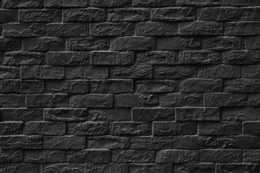 Koyu arkaplan dizaynı için siyah taş duvar dokusu.