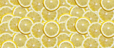 C vitamini konseptinde tasarım için limon dilimi arkaplanı.