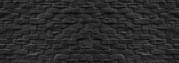 Surface of Vintage black brick wall background for design in your work Texture backdrop concept.