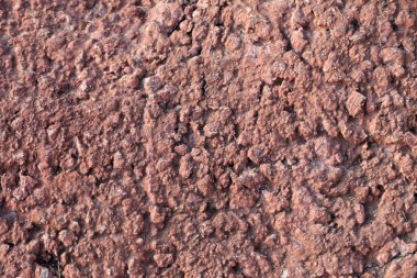 yıpranmış çimento duvarına dokulu.