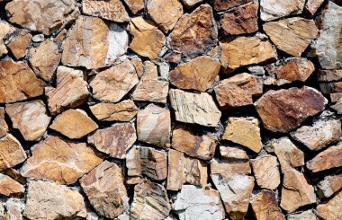 kahverengi taş duvar yüzeyi.