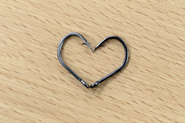 The black hooks placed heart symbols. — Stock Photo, Image