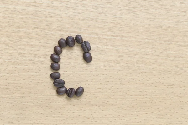 Coffee beans of alphabet. — Stock Photo, Image