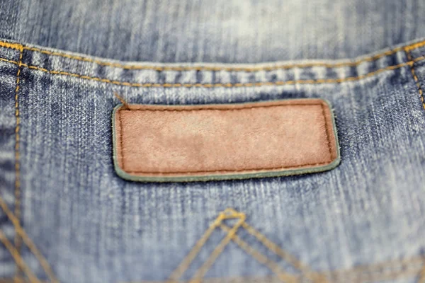 Die Rückseite der Jeans beschriften. — Stockfoto