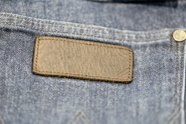 Die Rückseite der Jeans beschriften. — Stockfoto