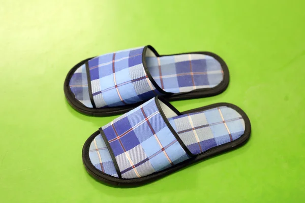 The blue slippers. — Stock Photo, Image