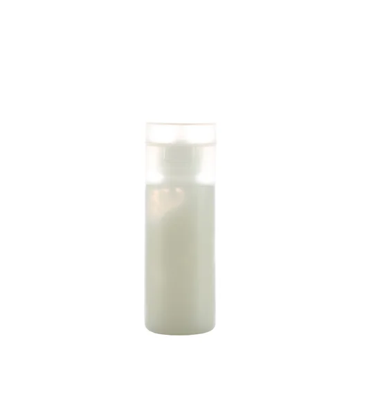 Kremowo-biały butelka na białym tle — Zdjęcie stockowe
