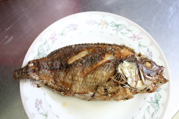Fried fish on a dish. — Stock Photo, Image