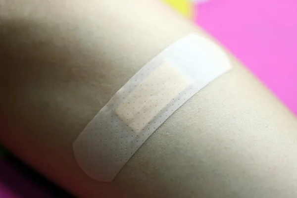 Adhesive plaster on skin. — Stock Photo, Image