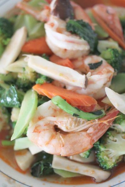 Puff shrimps mix broccoli. — Stock Photo, Image