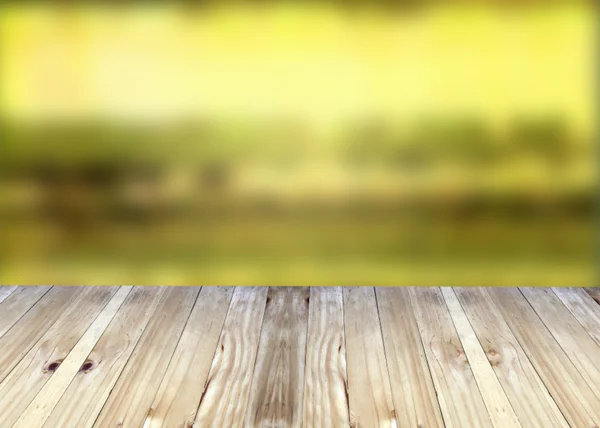 Broad planks and yellow blur background. — Stock Photo, Image