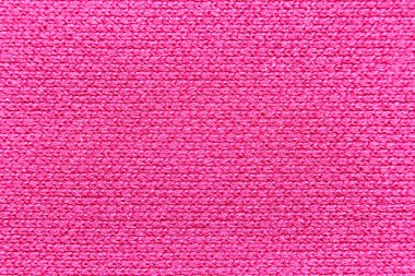 Pembe kumaşın dokusu.