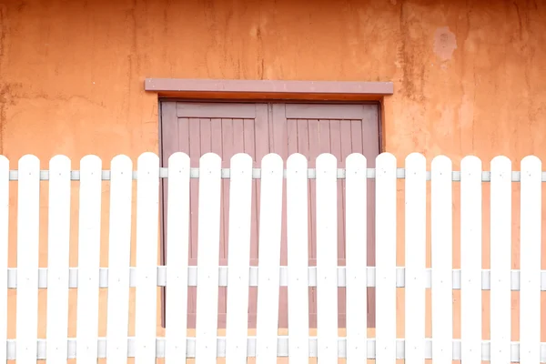 White fences and windows. — Stock Photo, Image