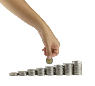 el izole üzerinde beyaz yığmak için paralar koymak.