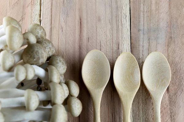 Shimeji mushroom and wooden spoon. — Stock Photo, Image