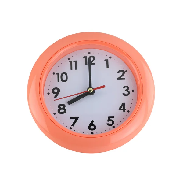 Horloge murale orange isolé sur blanc . — Photo