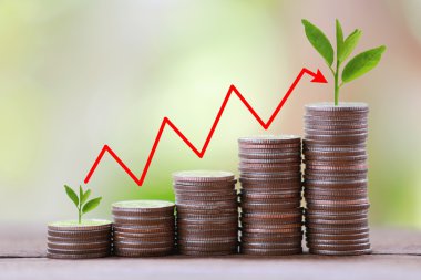 silver coin stack and arrow line in business growth concept on w