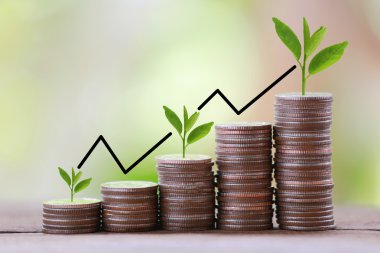 silver coin stack and arrow line in business growth concept on w