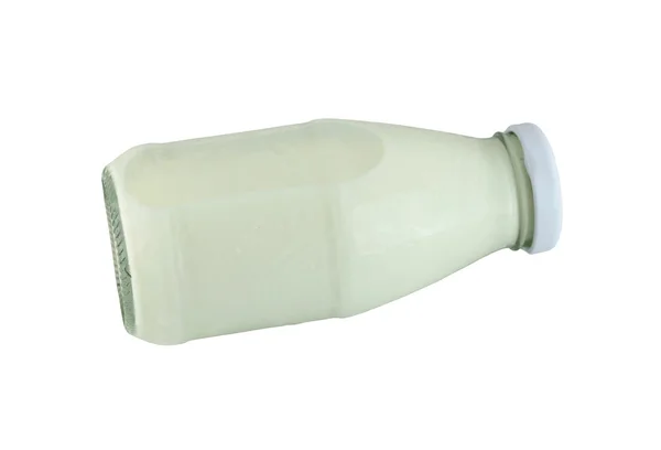 Botella de vidrio de leche aislada sobre un fondo blanco . — Foto de Stock