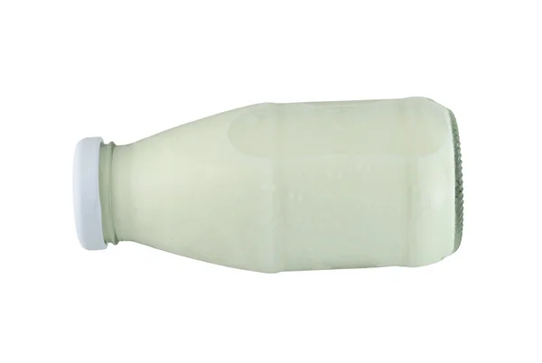 Frasco de vidro de leite isolado sobre um fundo branco . — Fotografia de Stock