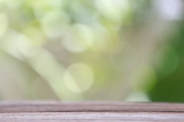 Wood floor and colorful bokeh. — Stock Photo, Image