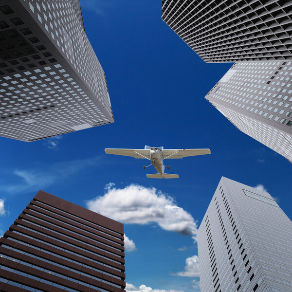 Skyscrapers and airplanes on sky for business concept.
