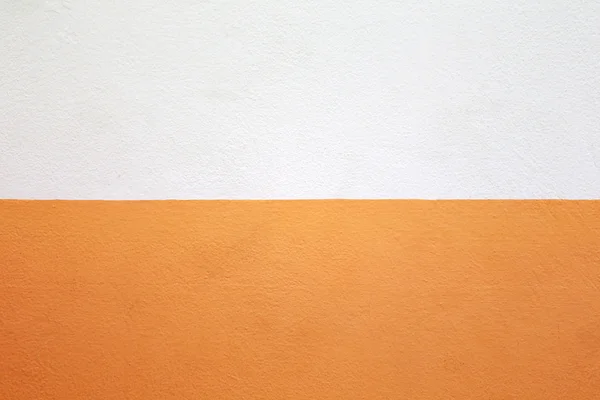 Cementowe ściany malowane kolor pomarańczowy i krem. — Zdjęcie stockowe